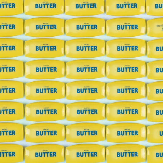 a repeating pattern of yellow butter squishy toys filled with vaseline. 