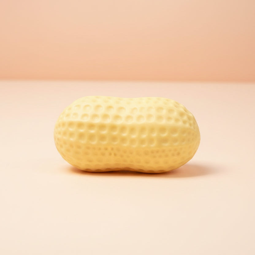 Peanut on a peach surface