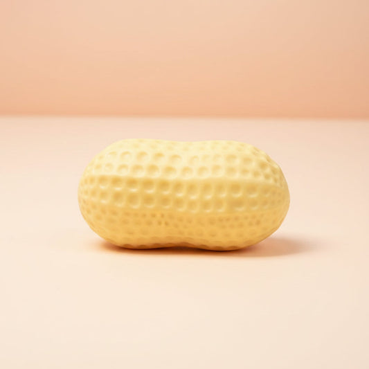 Peanut on a peach surface